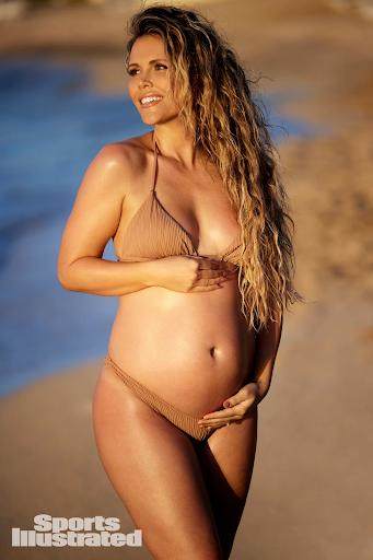 Katrina Scott was photographed by Derek Kettela in St. Croix. Swimsuit by Luli Fama. Cape by Katharina Hakaj Couture.